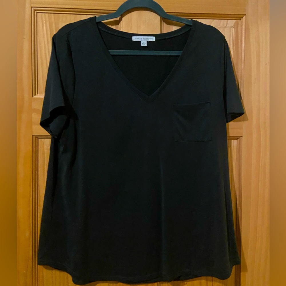 Black short sleeve v-neck shirt with front pocket